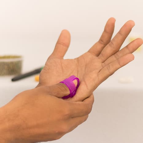 Seed therapy applied to pressure points on the hand